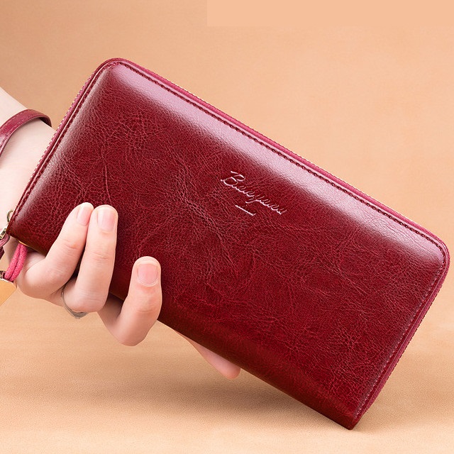 シンプルデザインのラウンドファスナーです。 カード収納力も有り、スマートに使えます。 サイズ：ヨコ/10.5cm タテ/20cm マチ/2.5cm 素材：牛革 カラー：イエロー ブラウン ブルー ブラ