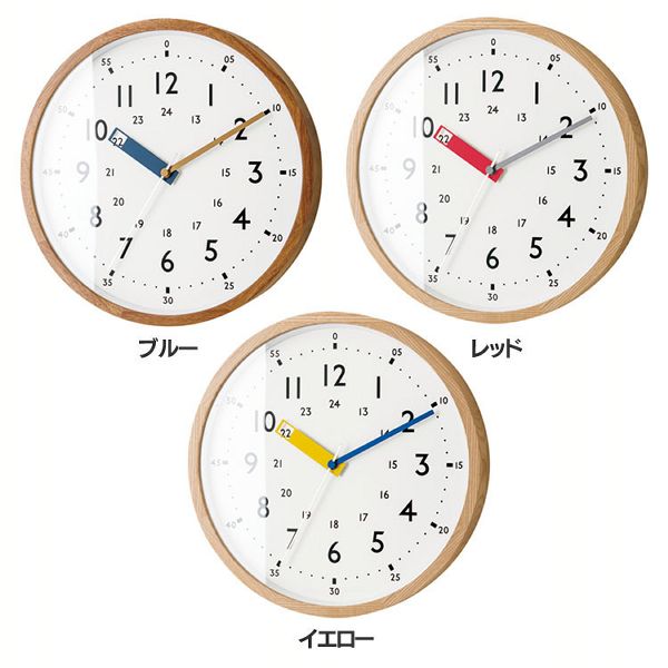 沢山の数字が配置されながらも、極力シンプルに仕上げた文字盤の上でカラフルな針がポイントになった壁掛け時計です。よく見てみると、時計の読み方のヒントが隠されています。ホワイトの文字盤に映えるカラフルなカ