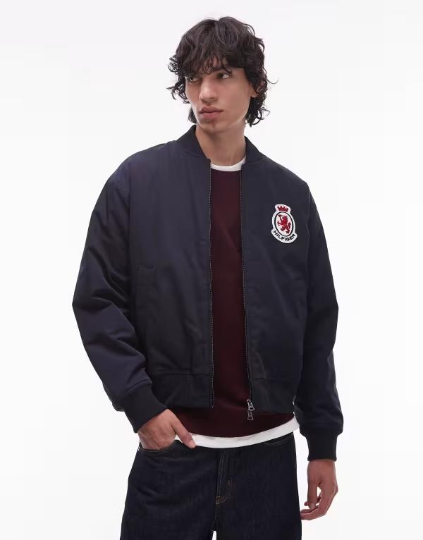トミー ヒルフィガー メンズ ジャケット・ブルゾン アウター Tommy Hilfiger crest bomber jacket in navy NAVY
