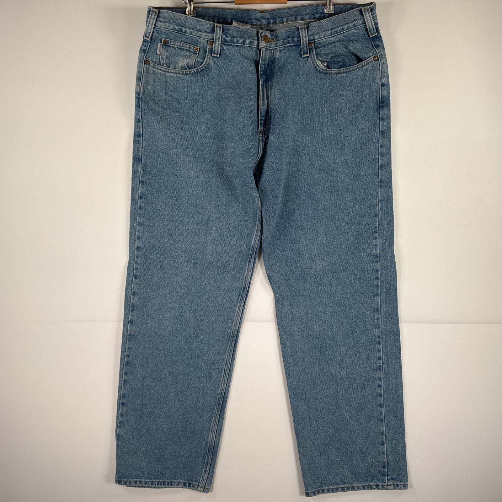 古着 カーハート Carhartt デニムパンツ ジーパン 5ポケット ワンポイント ロゴ ワークパンツ テーパード 大きいサイズ w42 L32 ブルー